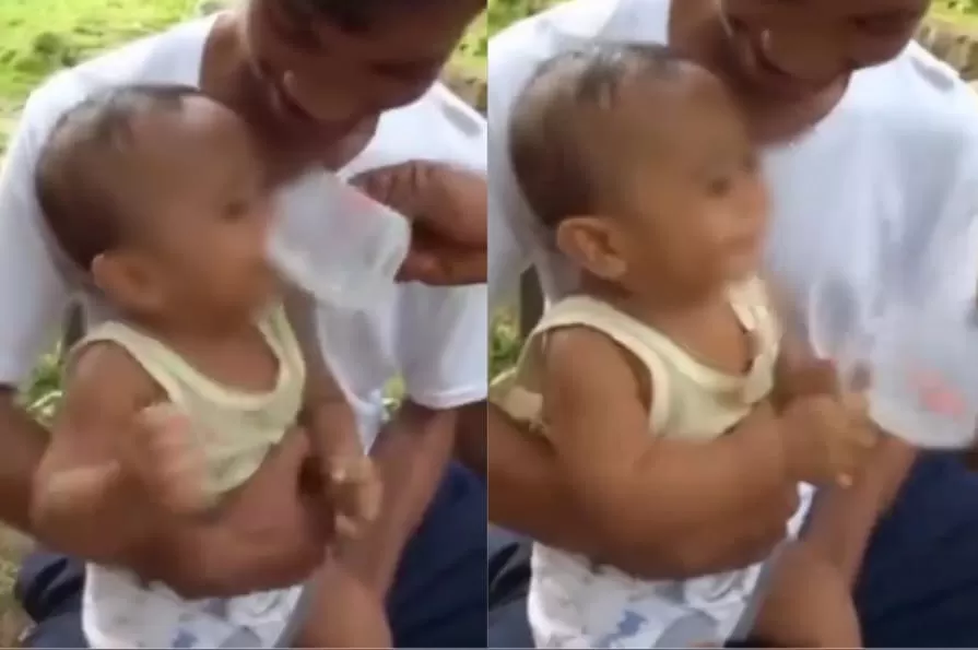 Viral Seorang Pria Berikan Minuman Alkohol kepada Anak Kecil di Pangkuan Orang Tuanya